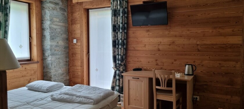 Imagen de la habitación del Mirtillo Alpino. Foto 14