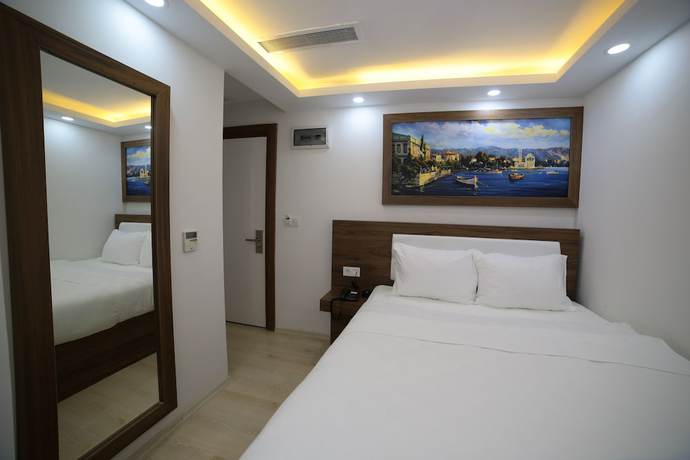 Imagen de la habitación del Mitani Suites. Foto 3