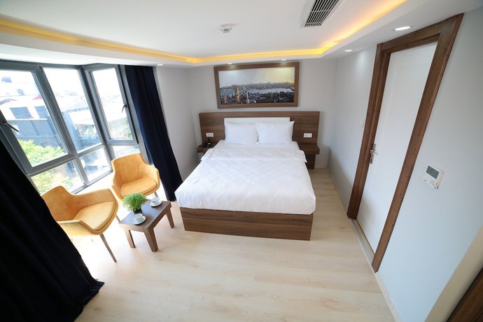 Imagen de la habitación del Mitani Suites. Foto 7