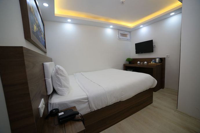 Imagen de la habitación del Mitani Suites. Foto 11