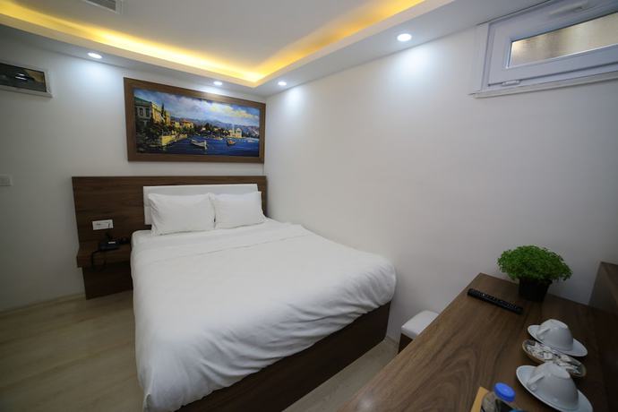 Imagen de la habitación del Mitani Suites. Foto 12