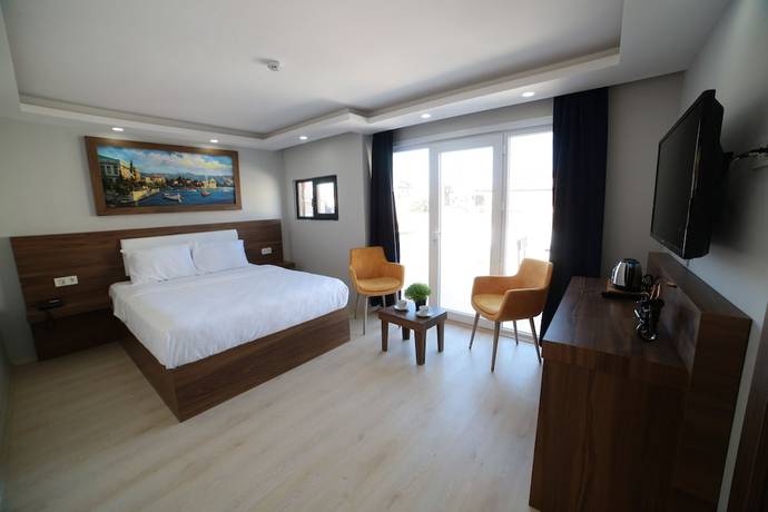 Imagen de la habitación del Mitani Suites. Foto 17