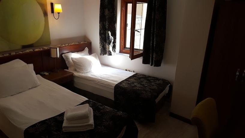 Imagen de la habitación del Mitos Hotel. Foto 6