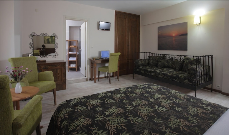 Imagen de la habitación del Mitos Hotel. Foto 16