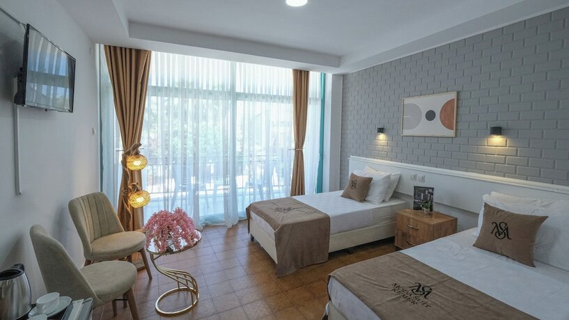 Imagen de la habitación del Moda Suit Hotel. Foto 13