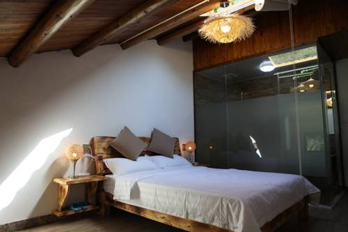 Imagen de la habitación del Moganshan Pinhouwu Hotel. Foto 2