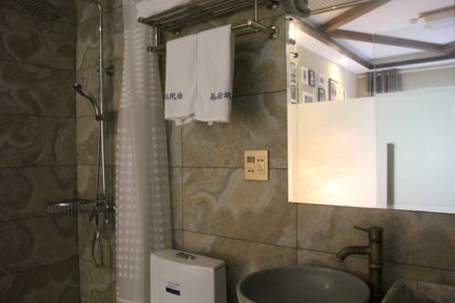 Imagen de la habitación del Moganshan Pinhouwu Hotel. Foto 6