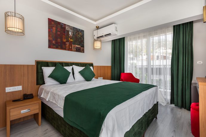 Imagen de la habitación del Mogons Exclusive Hotel. Foto 2