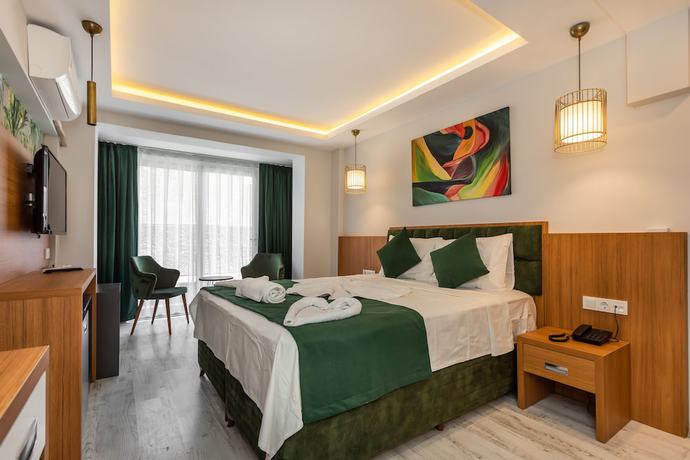 Imagen de la habitación del Mogons Exclusive Hotel. Foto 6
