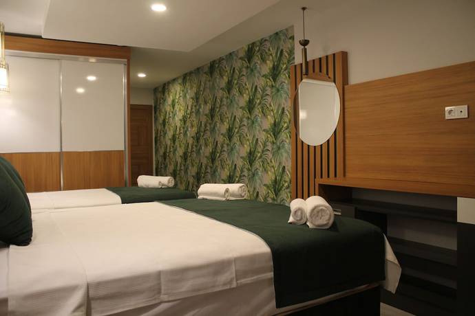Imagen de la habitación del Mogons Exclusive Hotel. Foto 7
