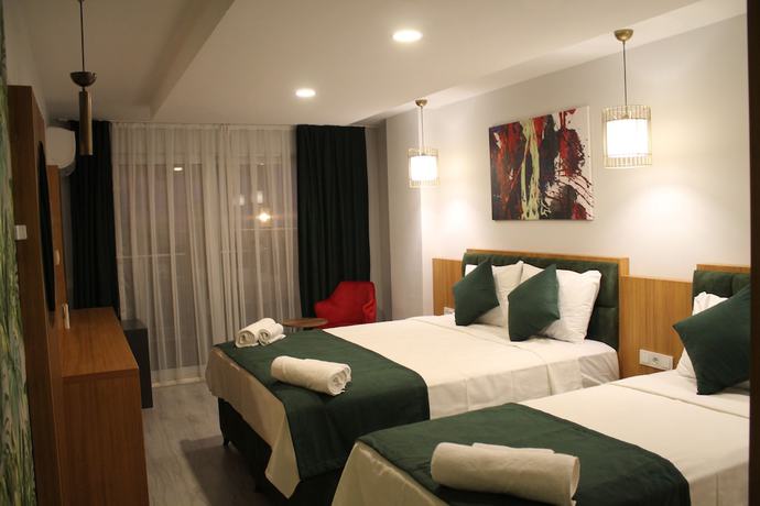 Imagen de la habitación del Mogons Exclusive Hotel. Foto 11
