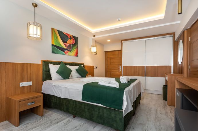 Imagen de la habitación del Mogons Exclusive Hotel. Foto 12
