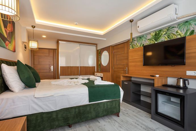 Imagen de la habitación del Mogons Exclusive Hotel. Foto 13