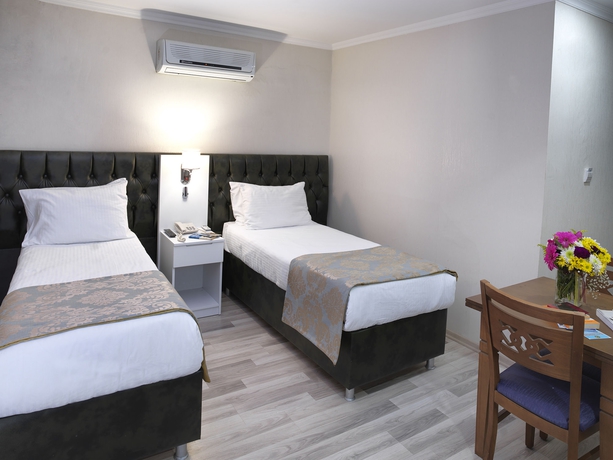 Imagen de la habitación del Monarch Hotel. Foto 9