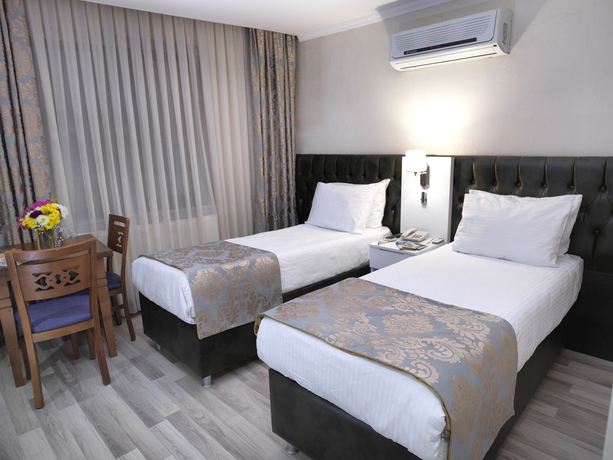 Imagen de la habitación del Monarch Hotel. Foto 10