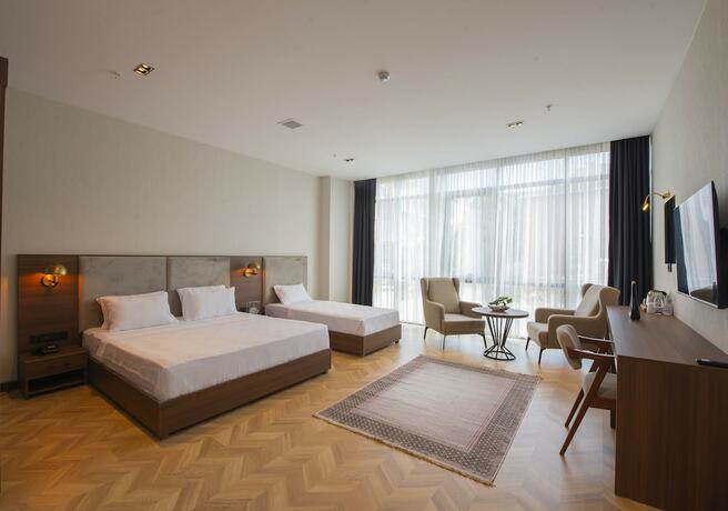 Imagen de la habitación del Moncher Hotel. Foto 13
