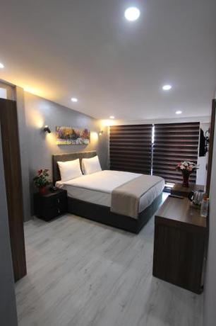 Imagen de la habitación del Monezza Hotel. Foto 14