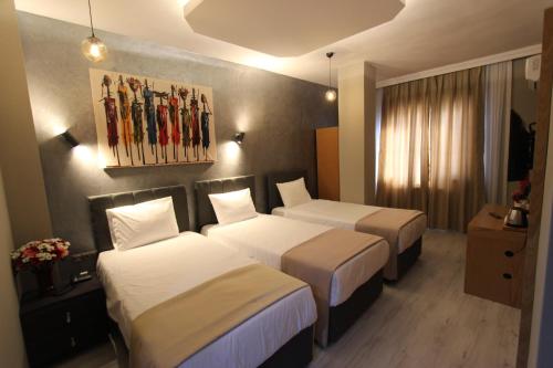 Imagen de la habitación del Monezza Hotel. Foto 17