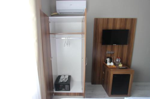Imagen de la habitación del Monezza Hotel. Foto 19
