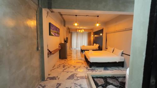 Imagen de la habitación del MonkeyArt Hotel&Cafe. Foto 20