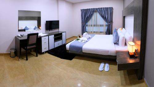 Imagen de la habitación del Montana Tower. Foto 19