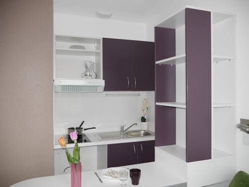 Imagen de la habitación del Montemp&ocirc; Apparth&ocirc;tel Lyon Sud. Foto 7