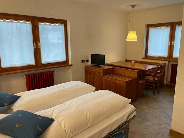 Imagen de la habitación del Monterosa Residence Hotel. Foto 16