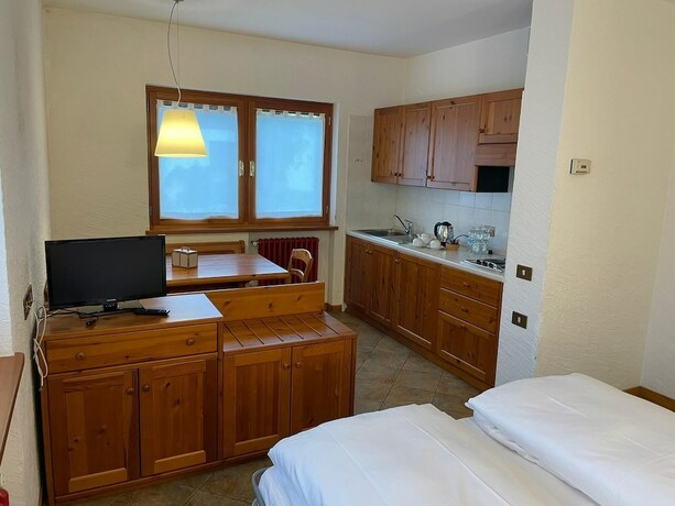 Imagen de la habitación del Monterosa Residence Hotel. Foto 18