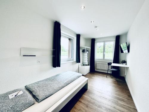 Imagen de la habitación del Monteurzimmer - Worker\'s accommodation - ZIMMERzuVERMIETEN in Deitingen Derendingenstrasse. Foto 10