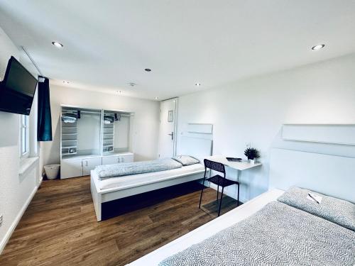 Imagen de la habitación del Monteurzimmer - Worker\'s accommodation - ZIMMERzuVERMIETEN in Deitingen Derendingenstrasse. Foto 11