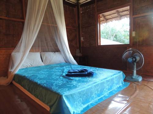 Imagen de la habitación del Mookies Bungalow. Foto 12