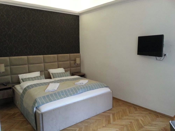 Imagen de la habitación del Moonriver Inn Chmielna 5. Foto 9