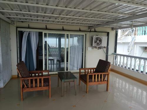 Imagen de la habitación del Morjim Sea View Cottages & Rooms. Foto 20