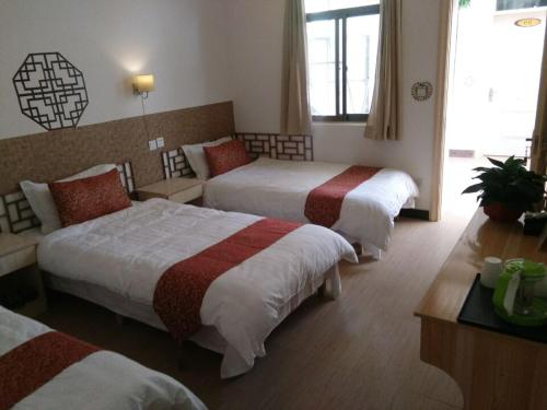 Imagen de la habitación del Moshangke Style Inn. Foto 4