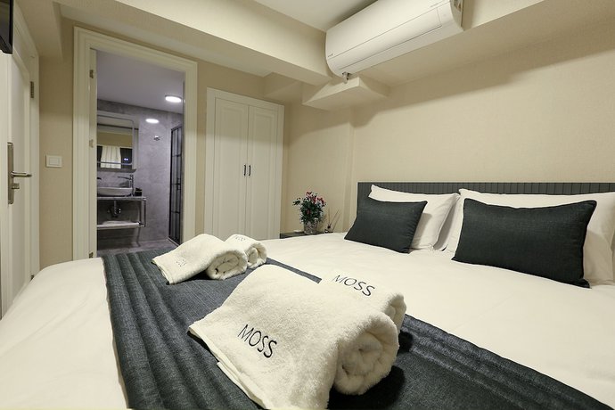 Imagen de la habitación del Moss Suites Hotel. Foto 8