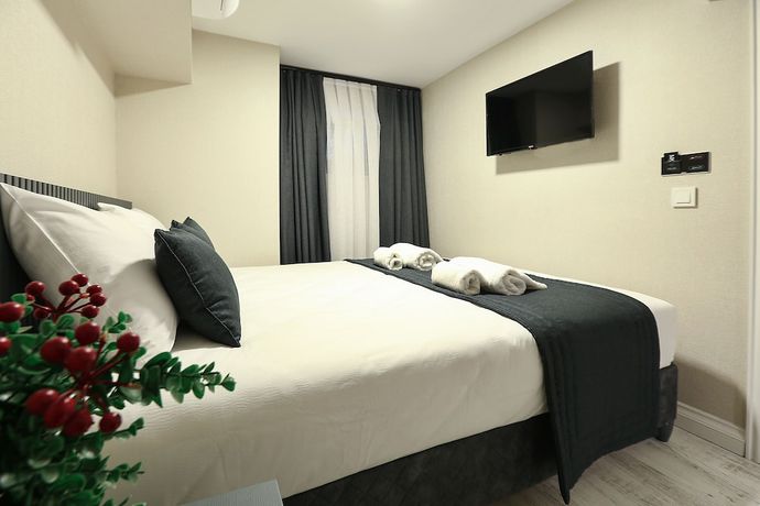 Imagen de la habitación del Moss Suites Hotel. Foto 12