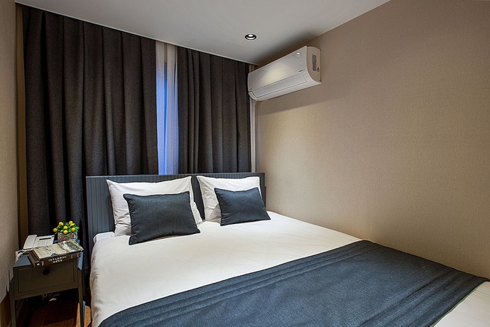 Imagen de la habitación del Moss Suites Hotel. Foto 14