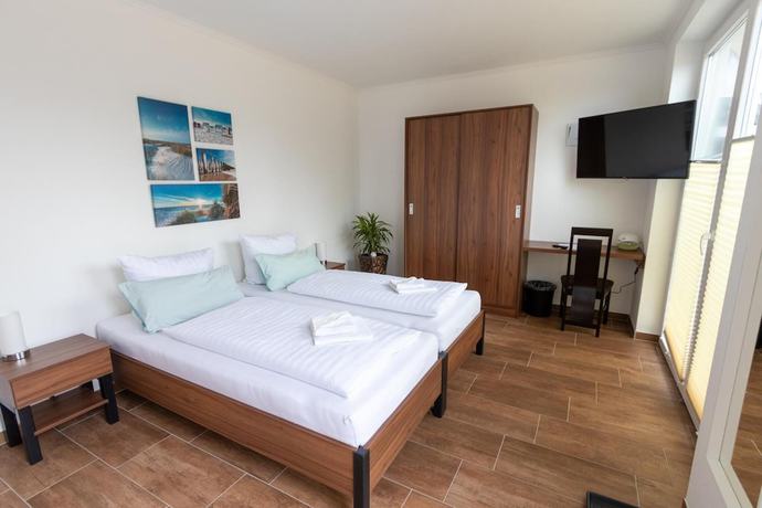 Imagen de la habitación del Motel Am B&uuml;rgerpark. Foto 14