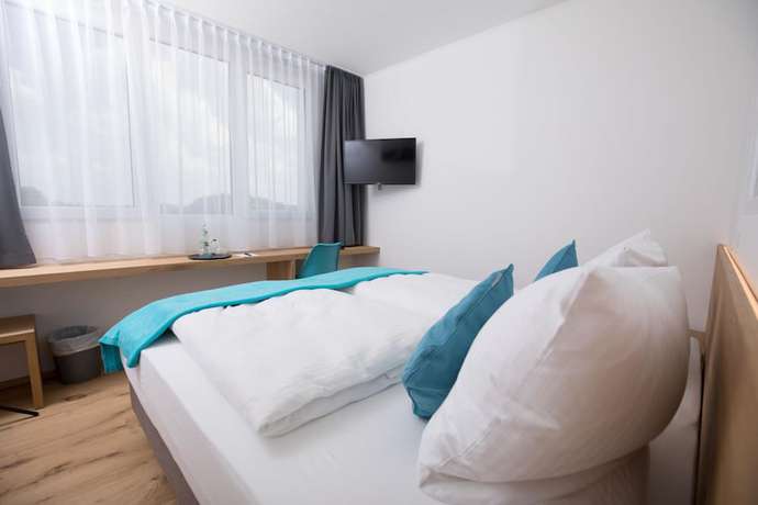 Imagen de la habitación del Motel Isar. Foto 9