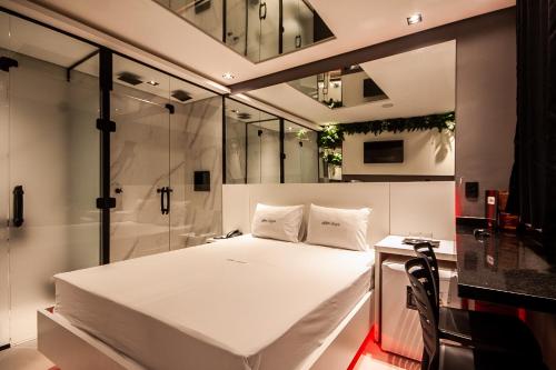 Imagen de la habitación del Motel Jardim Secreto. Foto 17