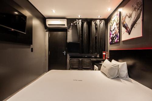 Imagen de la habitación del Motel Jardim Secreto. Foto 18