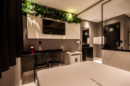 Imagen de la habitación del Motel Jardim Secreto. Foto 20