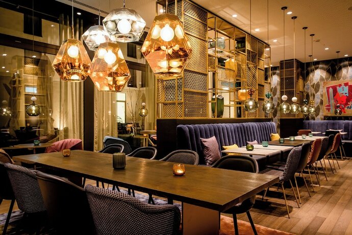 Imagen del bar/restaurante del Motel One Aachen. Foto 9