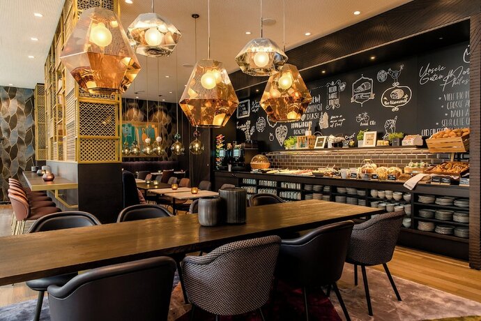 Imagen del bar/restaurante del Motel One Aachen. Foto 10