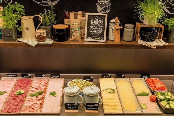 Imagen del bar/restaurante del Motel One Aachen. Foto 16