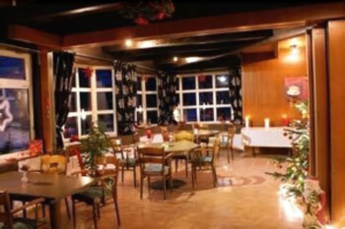 Imagen del bar/restaurante del Motel Ostsee Lodge. Foto 7