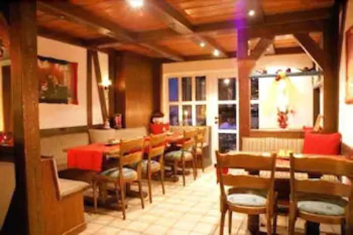 Imagen del bar/restaurante del Motel Ostsee Lodge. Foto 8