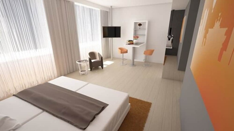 Imagen de la habitación del Motel Plus Sch&ouml;nefeld. Foto 7