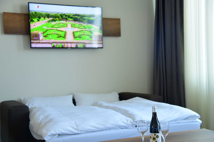 Imagen de la habitación del Motel Plus Sch&ouml;nefeld. Foto 9