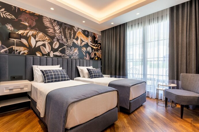 Imagen de la habitación del Motif Hotel. Foto 11